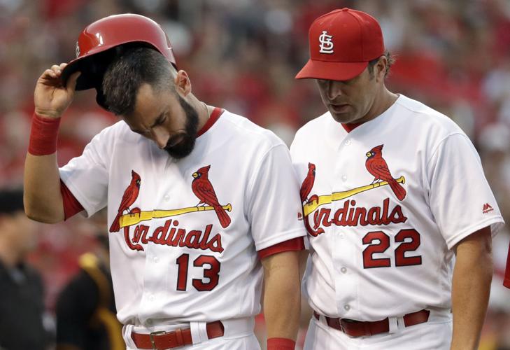 Carpenter, Holliday send Cardinals to win over Pirates in 12 innings