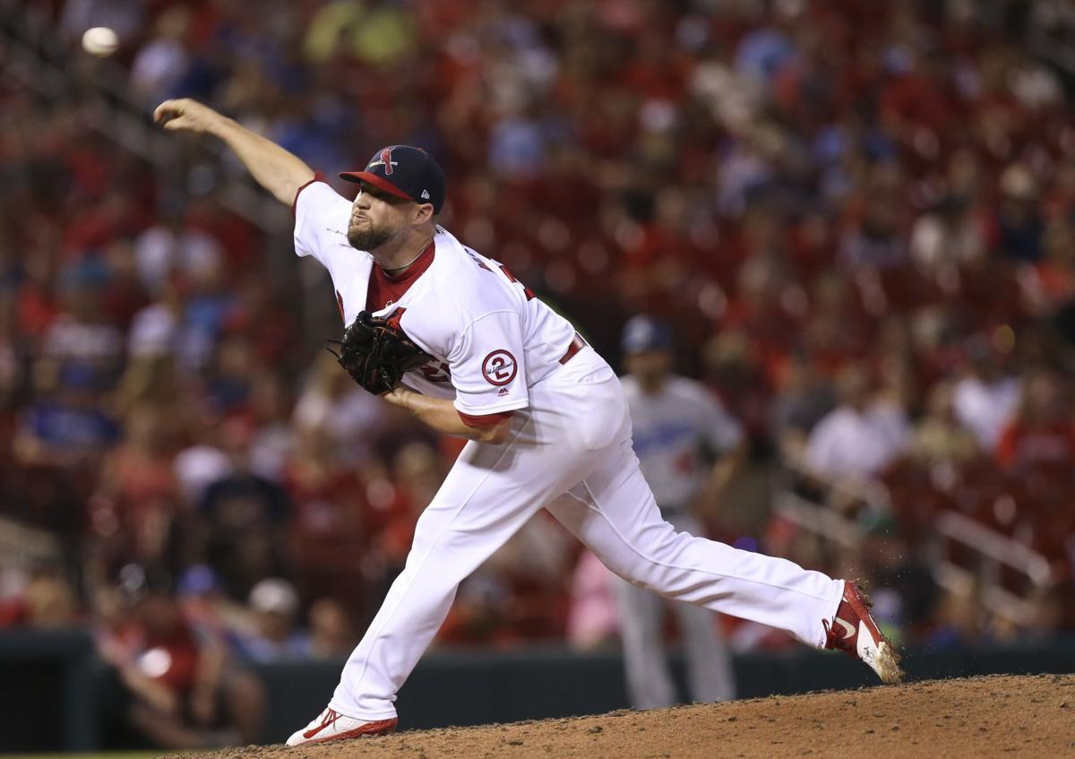 MLB roundup: Cardinals' Wainwright, Molina reach milestone