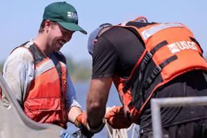 USGS collects nets and conducts research in effort to minimize invasive carp fish at Creve Coeur Lake