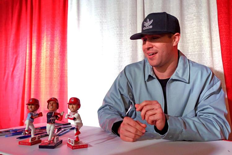St. Louis Cardinals third baseman Nolan Arenado signs autographs