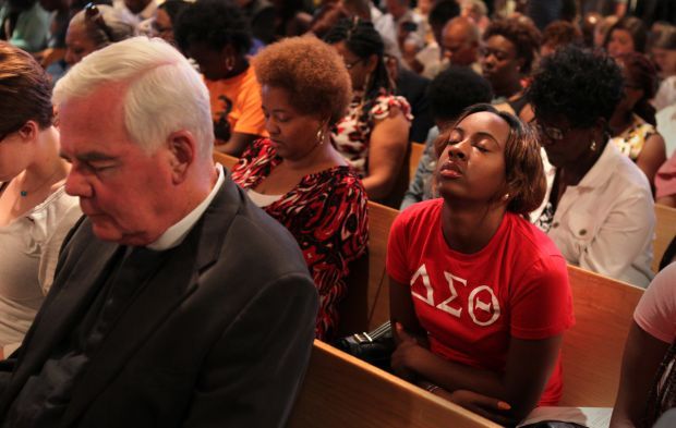 Residents, clergy gather at church forum looking for answers in shooting of Michael Brown
