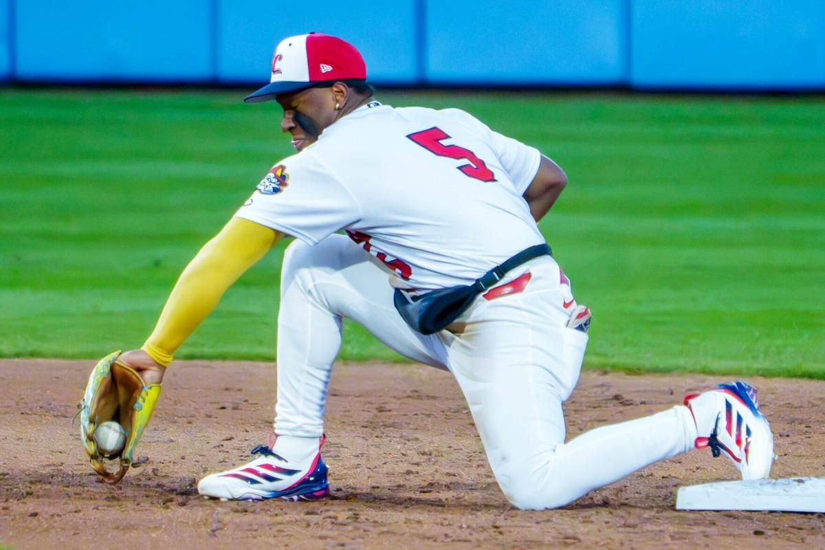 Peoria shortstop Jesús Baéz backhands a tough throw to second for a force out against South Bend during the Chiefs' home opener