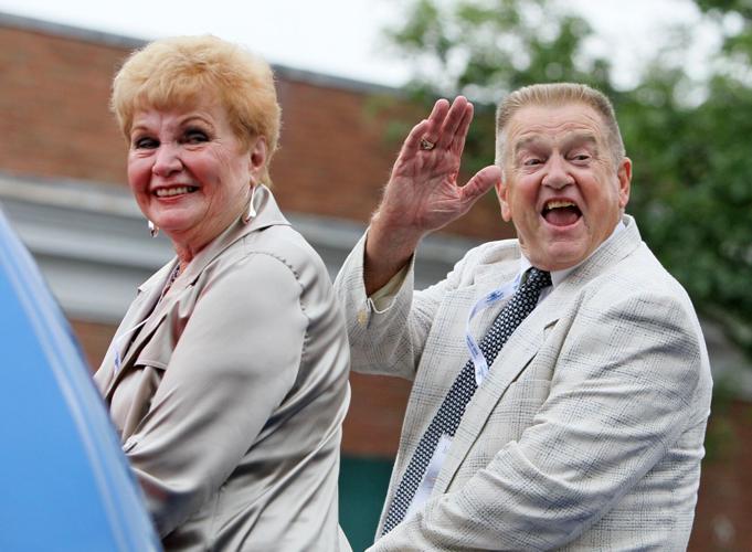 Whitey Herzog and other hall of famers participate in a parade down Main St. in Cooperstown, NY.