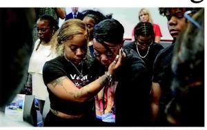 Three charged in fatal shooting