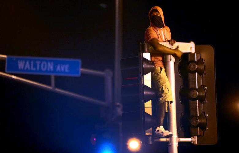 Vigil held for Mansur Ball-Bey, killed by police