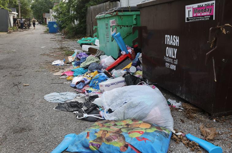 Trash spills out into the alley at Louisiana and Walsh