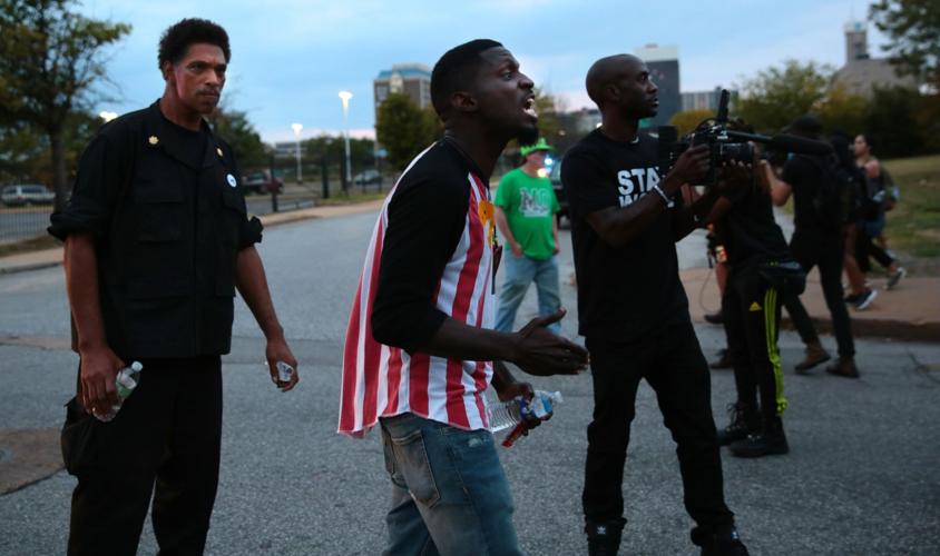 Protesters spend day at police headquarters