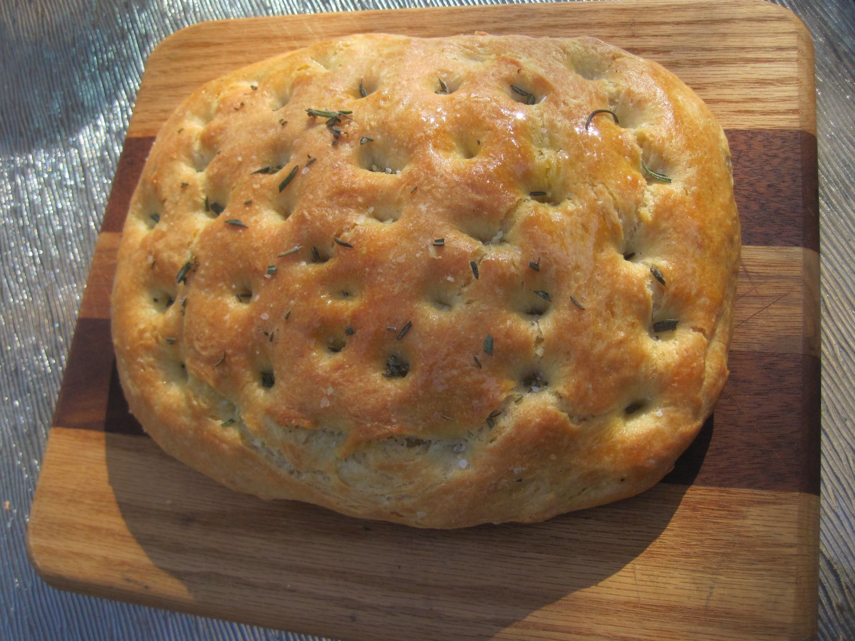 1111 Mississippi tops focaccia with rosemary and onions photo photo