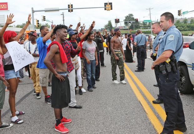 People protest the shooting of Michael Brown