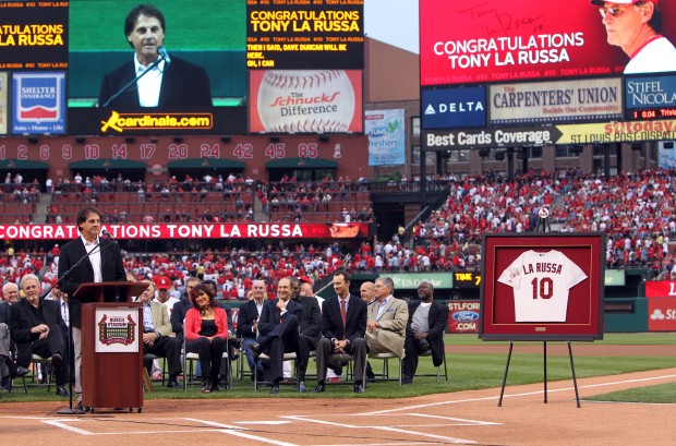 St. Louis Cardinals manager Tony La Russa hugs wife Elaine and daughter  Devon during a celebration ceremony for the new World Champions at Busch  Stadium in St. Louis on October 29, 2006.