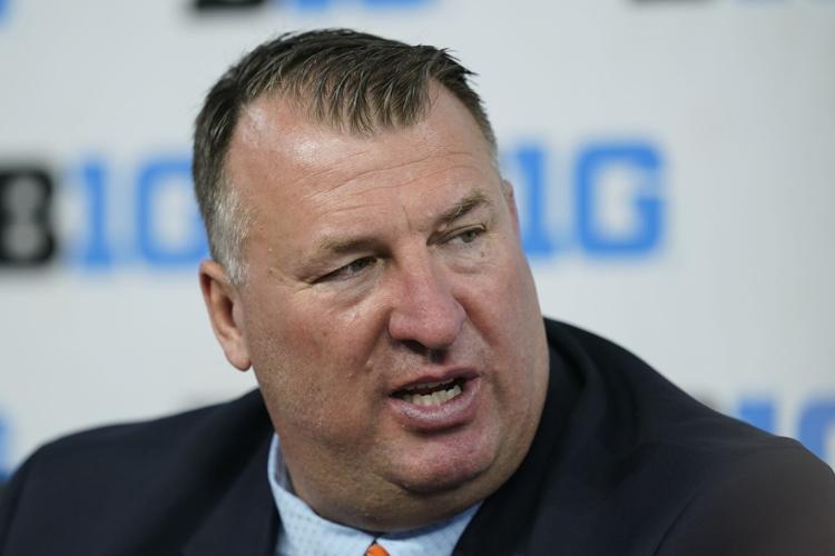 Illinois football coach Bret Bielema travels to coach at Michigan a day  after mom's death