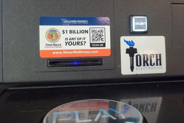Treasurer advertising on a Torch Electronics machine