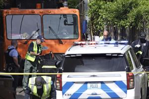 St, Louis trash truck backs over, kills woman