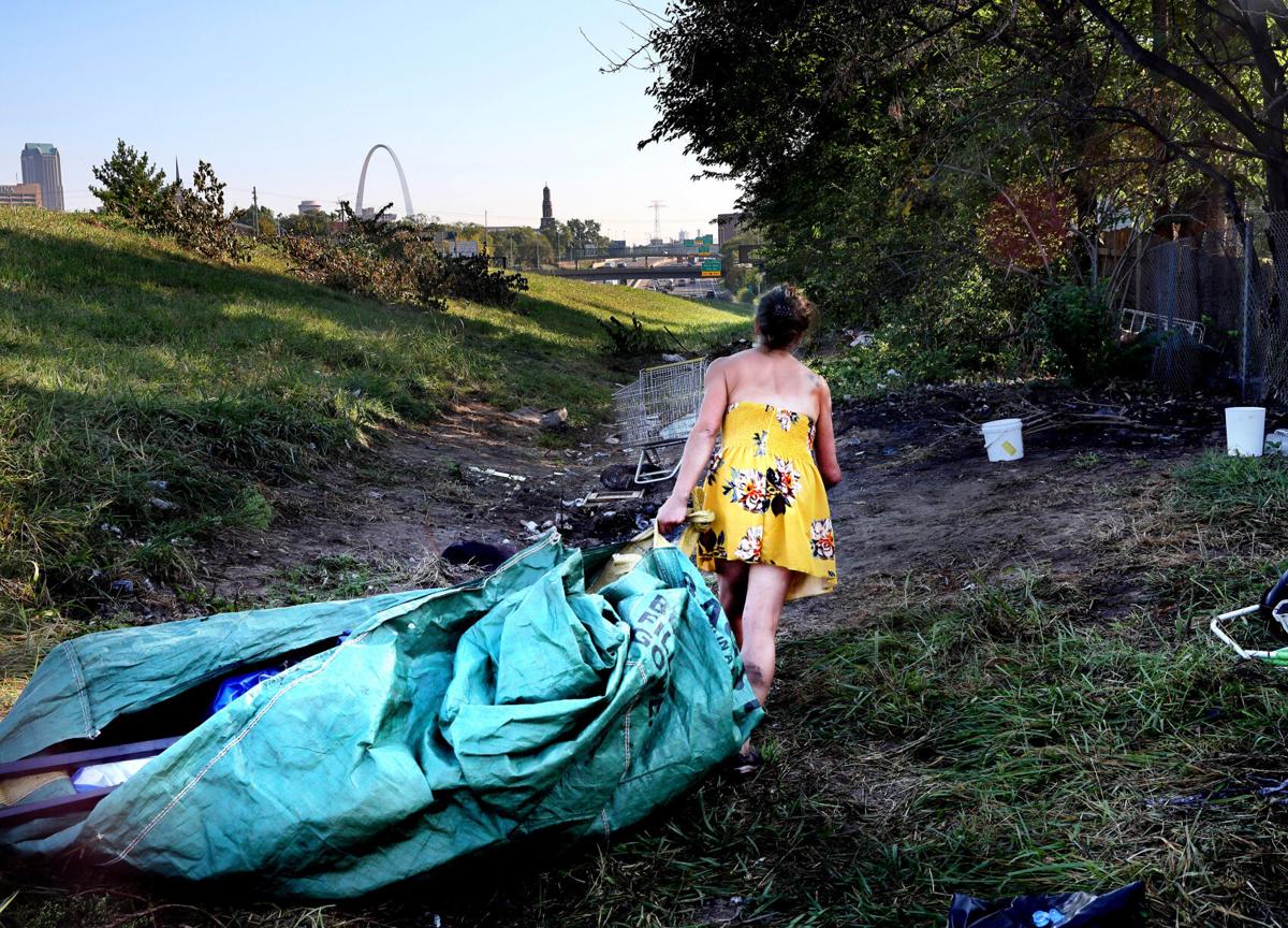 Homeless woman removed from land along highway on ramp