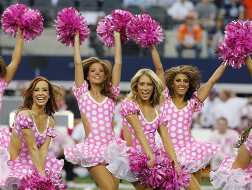 Seattle Seahawks cheerleaders pink pom,poms awareness.