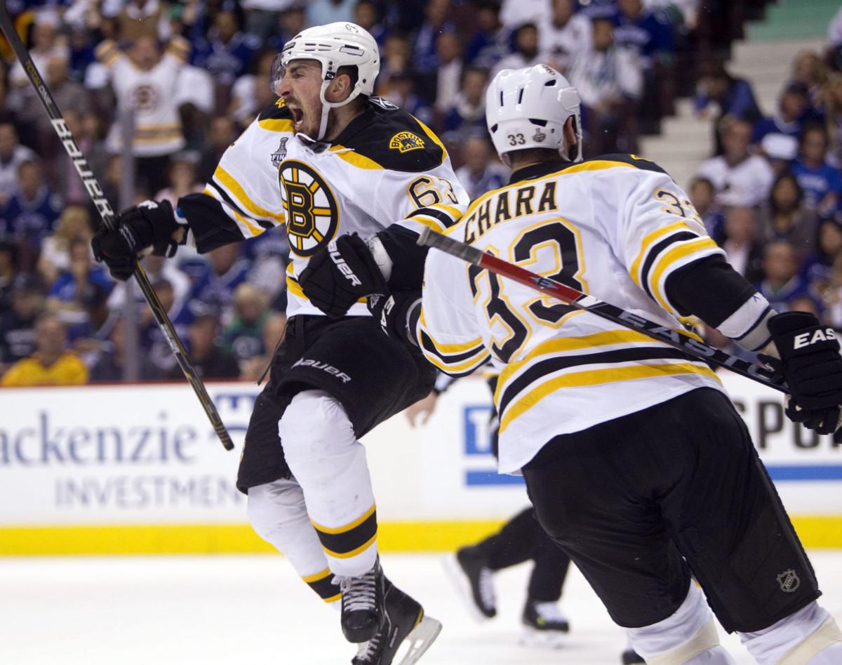 APTOPIX Stanley Cup Bruins Canucks Hockey
