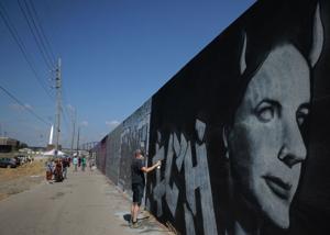 Paint St. Louis puts new art on an old downtown St. Louis wall