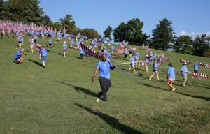 Flags of Valor memorial covers Art Hill in Forest Park