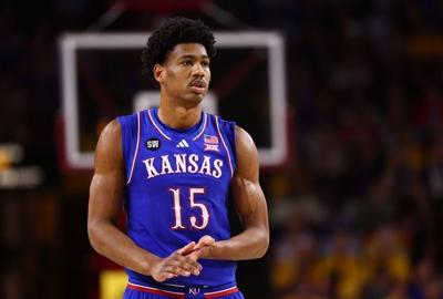 Mar 3, 2026; Tempe, Arizona, USA; Kansas Jayhawks forward Bryson Tiller (15) against the Arizona State Sun Devils at Desert Financial Arena. Mandatory Credit: Mark J. Rebilas-Imagn Images