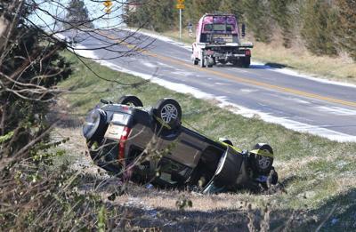 Wrecked cars remain after weekend storm