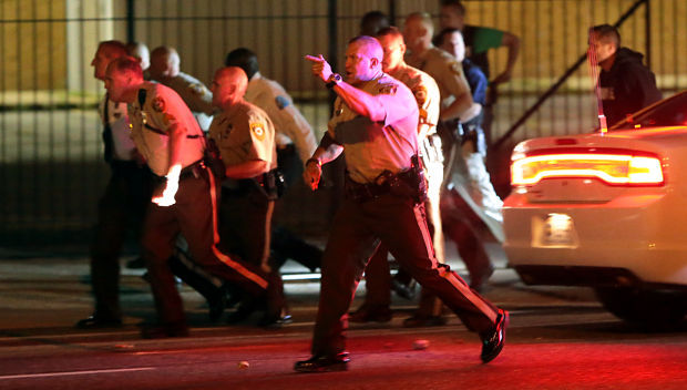 Police move toward protesters