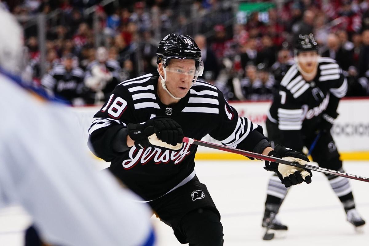 New Jersey Devils' Ondrej Palat (18) skates with the puck against