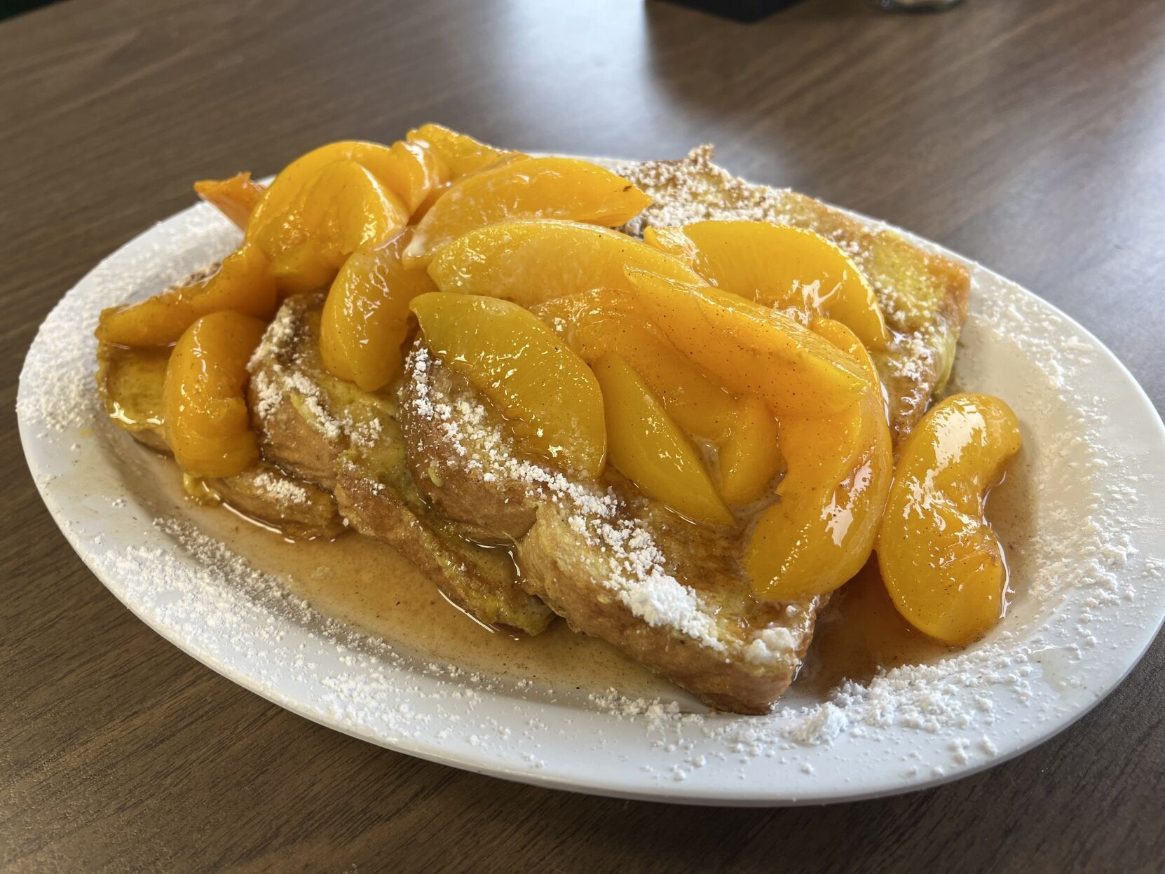 Affton Diner French toast starts with a peach syrup reduction pic