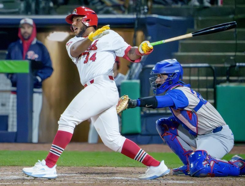 Peoria catcher Rainiel Rodriguez watches his hit leave the infield for a base hit against South Bend during the Chiefs' home opener Tuesday, April 7, 2026 at Dozer Park. The Chiefs routed the Cubs 10-1.