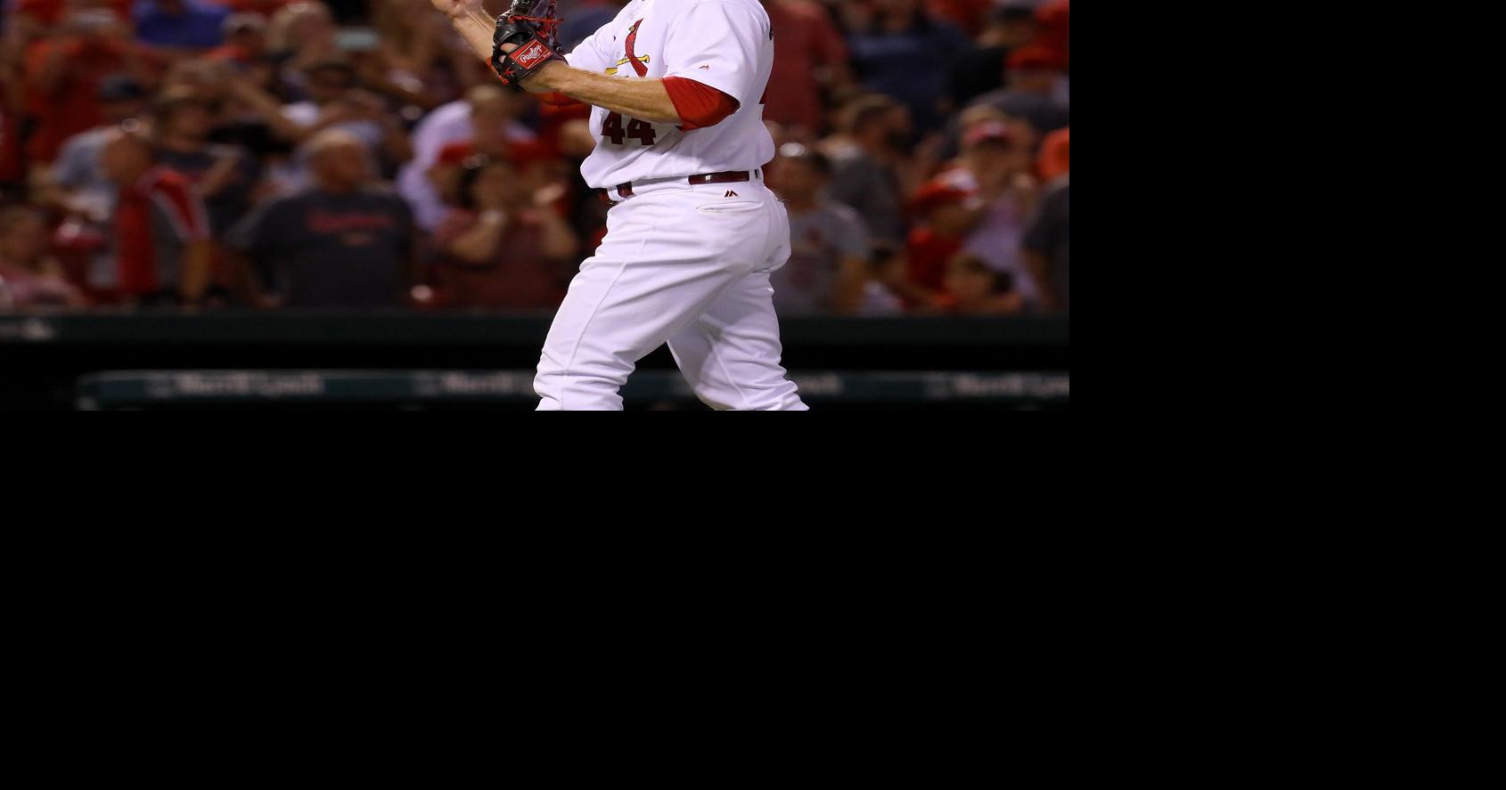 Head injuries inspire Cards relievers to wear cap inserts