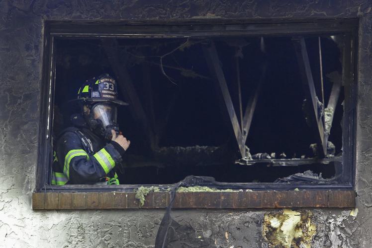 Man who fell to his death in fire at Ellisville condo complex identified