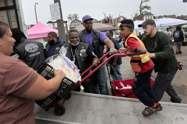 Save-A-Lot parking lot becomes a grassroots community hub for food, clothing and supplies