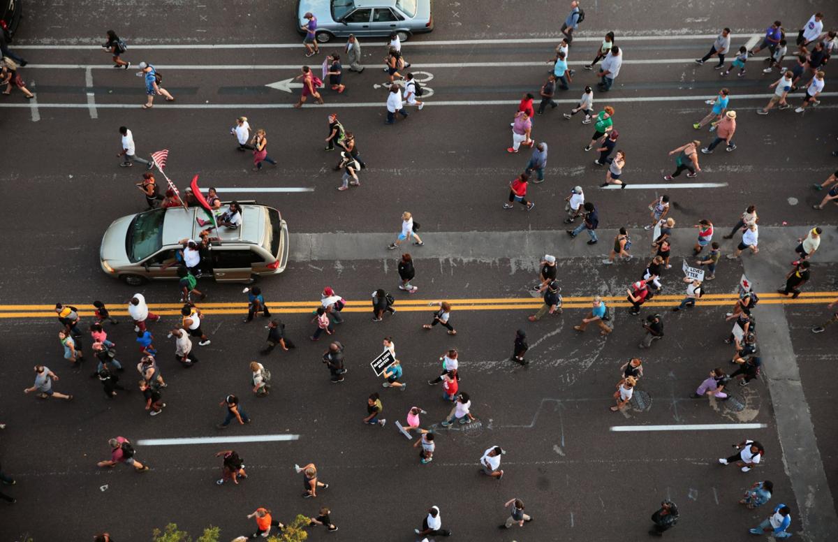 Protesters spend day at police headquarters