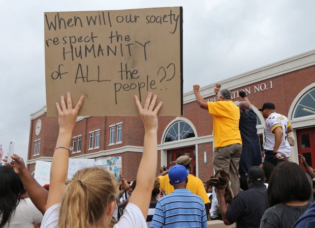 People protest the shooting of Michael Brown