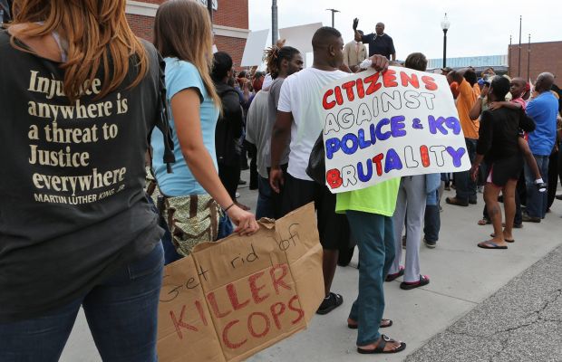 People protest the shooting of Michael Brown
