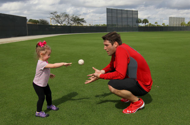 St. Louis Cardinals pitcher Lance Lynn and daughter Mia