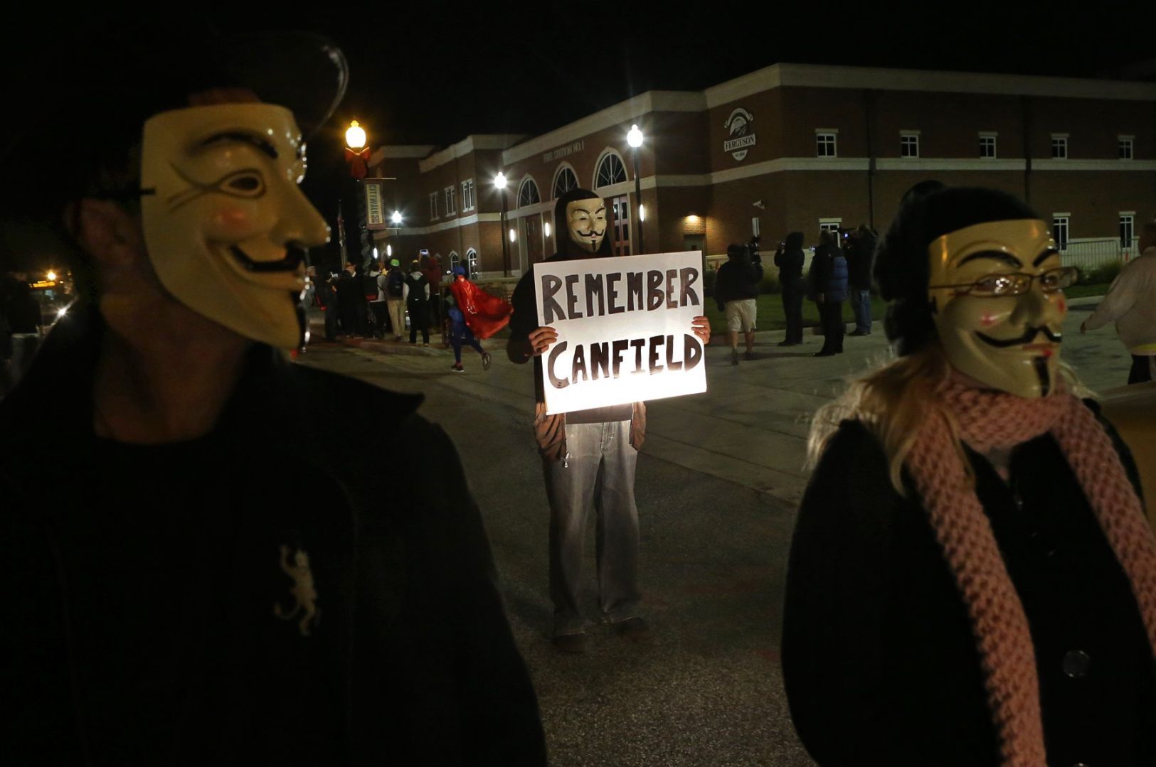 Masked Protesters Confront Police During March In Ferguson | Law And ...