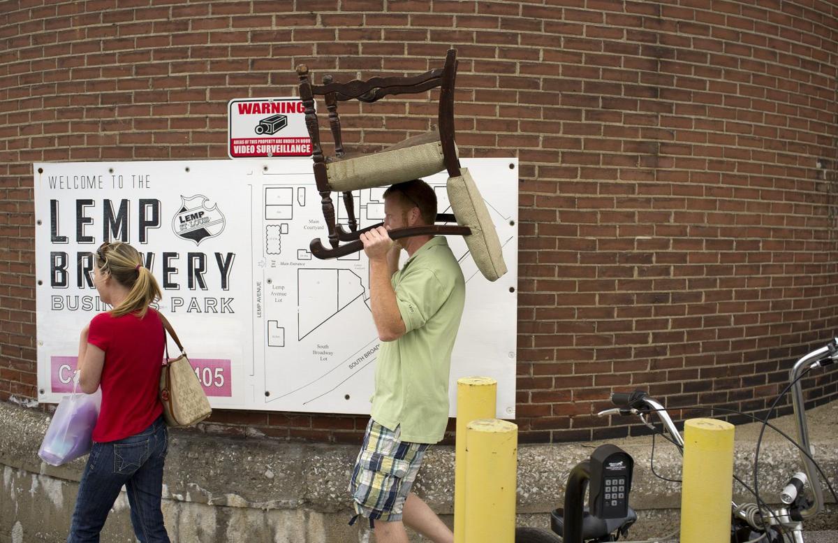Outdoor swap meet opening on the riverfront downtown