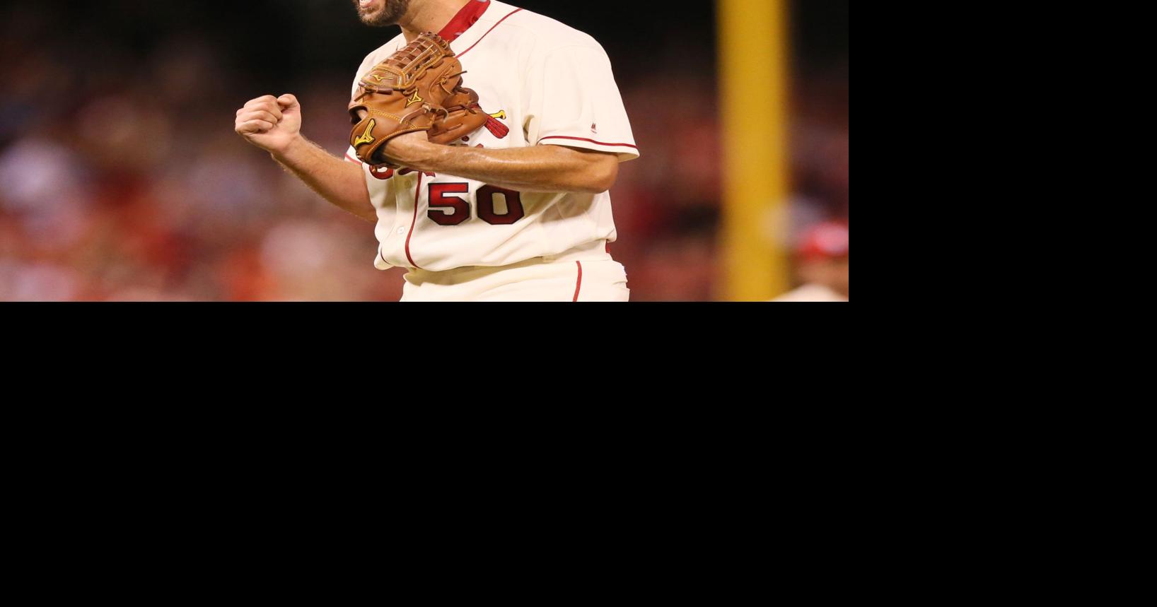 St. Louis Cardinals infielder David Eckstein warms up prior to