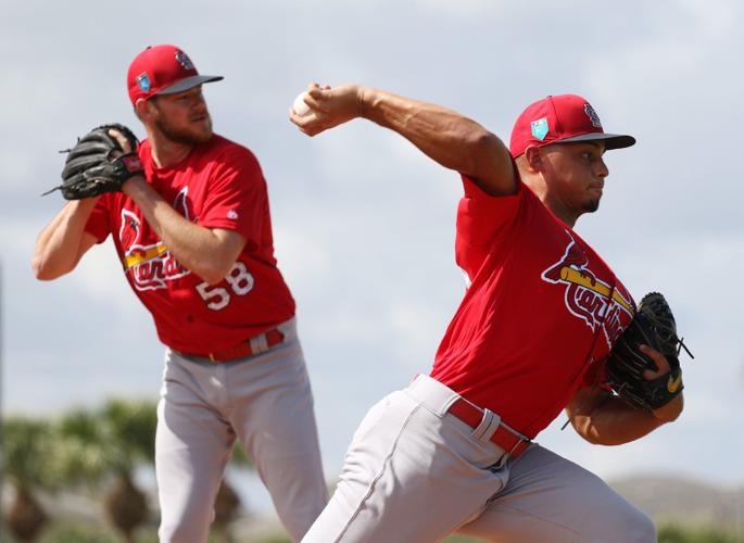 Photos Cardinals open camp with pitchers throwing first bullpen session