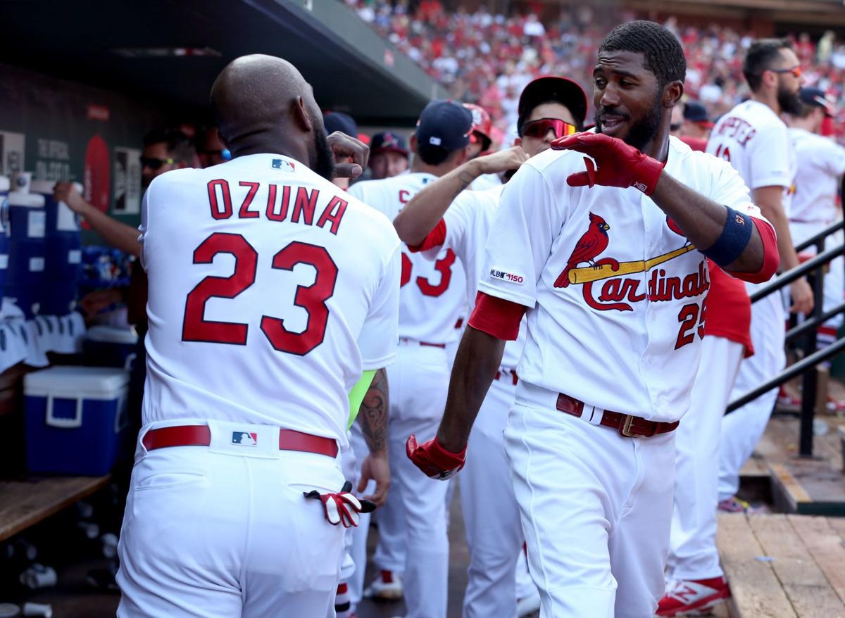 MLB Also Told Cardinals Players They Had to Ditch Their Sleeves (But Not  Marcell Ozuna's Neon One) - Bleacher Nation