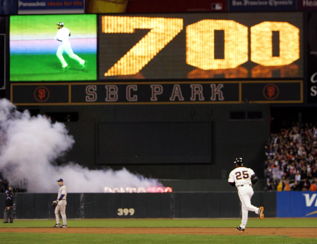 2004: Barry Bonds hits 700th home run, joining Babe Ruth and Hank Aaron