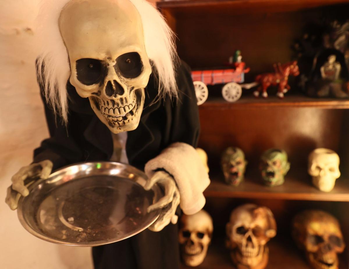 Halloween enthusiast keeps permanent themed display