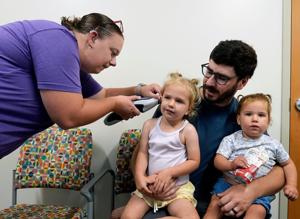 Wisconsin sisters with rare hearing loss receive newly approved therapy