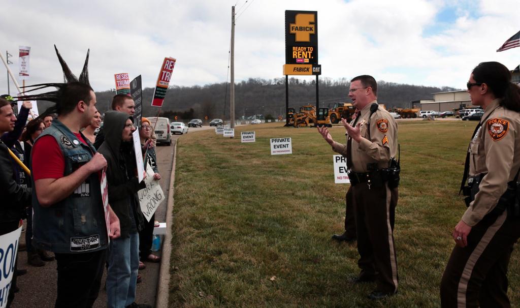 Protesters Debate Each Other While Pence Speaks At Fabick Plant