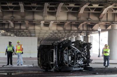 Overturned SUV under Interstate 70