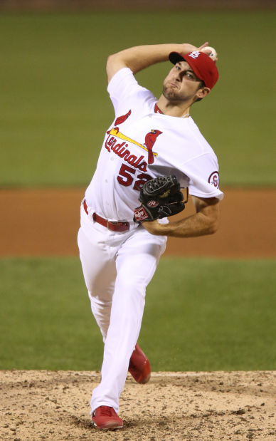 St. Louis Cardinals pitcher Michael Wacha can't make a play on a ball hit  by Washington Nationals Ryan Zimmerman in the ninth inning at Busch Stadium  in St. Louis on September 24