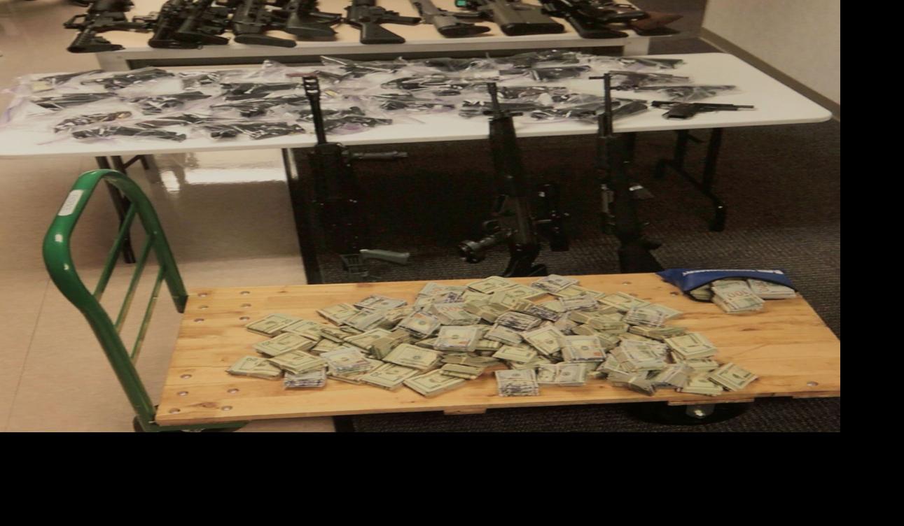 Seized guns and money