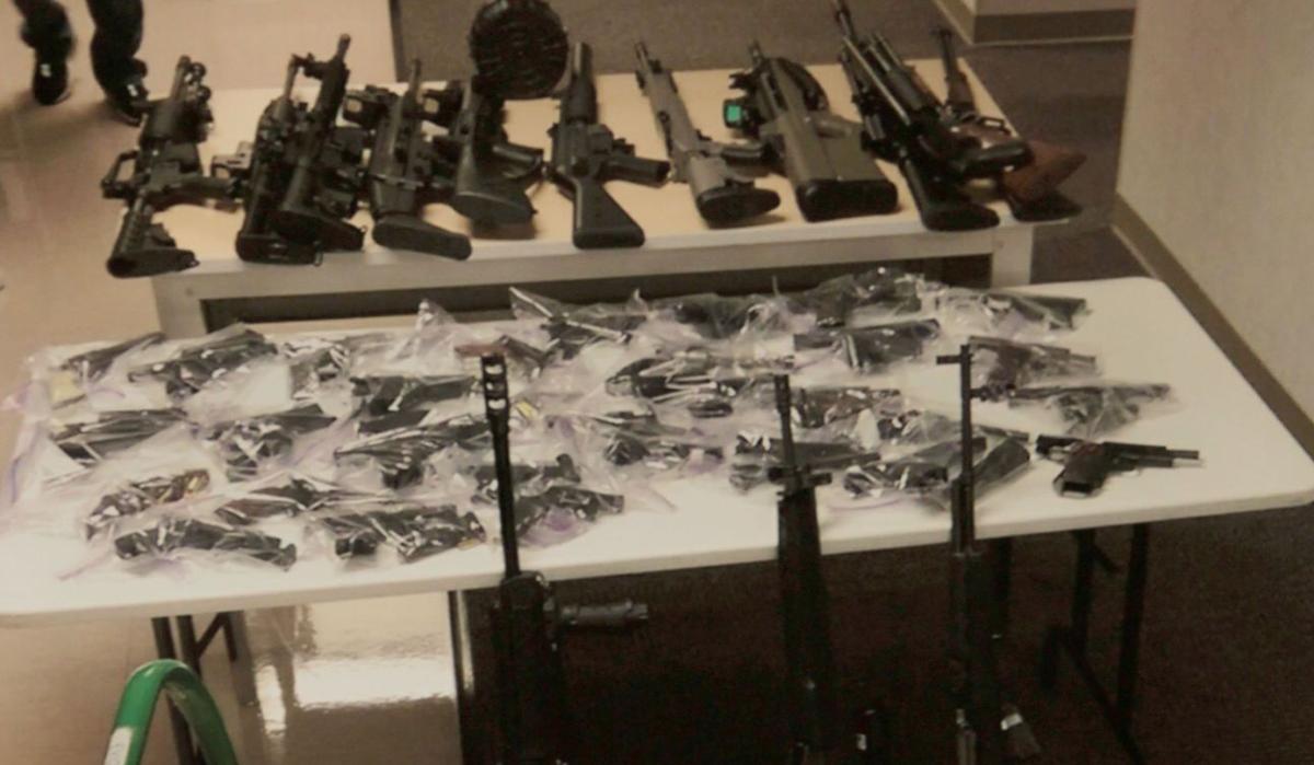 Seized guns and money