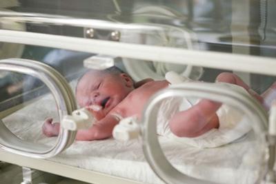 Baby in incubator