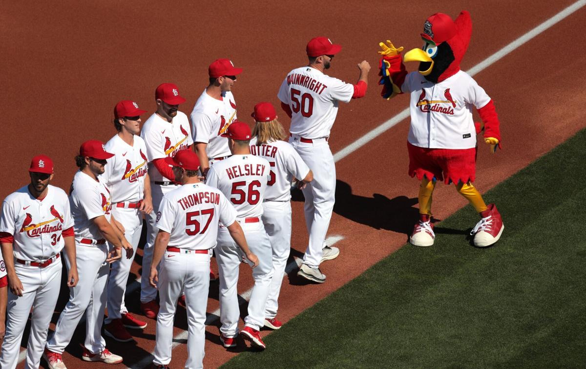 Tony La Russa misses Cardinals opener for health reasons; Scott Rolen  throws first pitch